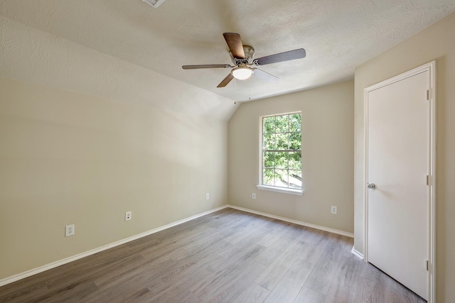 2802 Austin St, Houston, TX 77004 - empty room featuring wood finished floors, ceiling fan, baseboards, and lofted ceiling