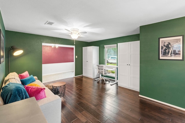 5918 Donwhite Ln, Houston, TX 77088 - living room with a ceiling fan, baseboards, wood-type flooring, and a desk