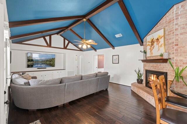 5918 Donwhite Ln, Houston, TX 77088 - living area with ceiling fan, a fireplace, and dark wood-style floors