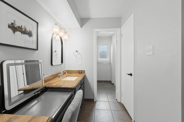 5918 Donwhite Ln, Houston, TX 77088 - bathroom with tile patterned floors, baseboards, and vanity