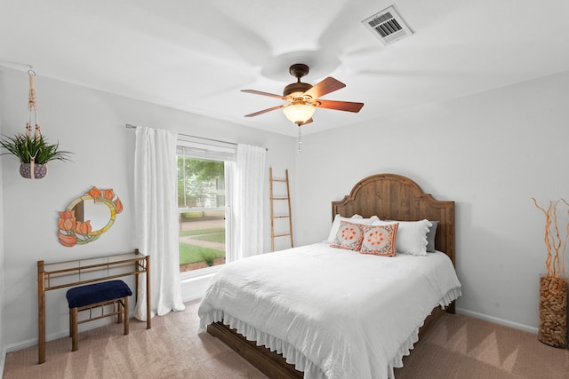 5918 Donwhite Ln, Houston, TX 77088 - bedroom featuring carpet, baseboards, and a ceiling fan