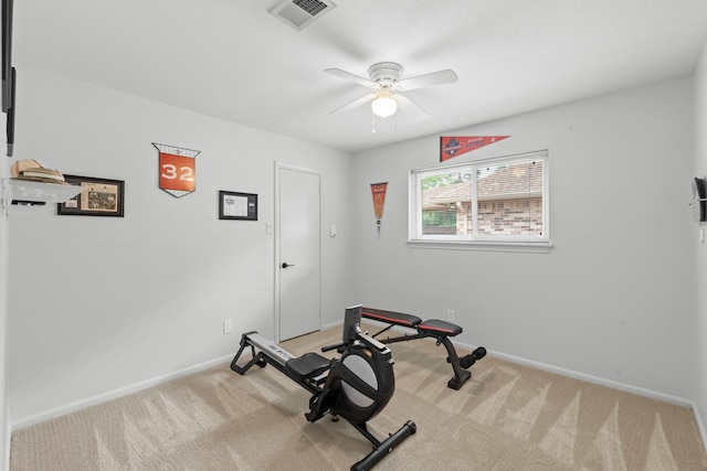 5918 Donwhite Ln, Houston, TX 77088 - workout room featuring ceiling fan, light colored carpet, and baseboards