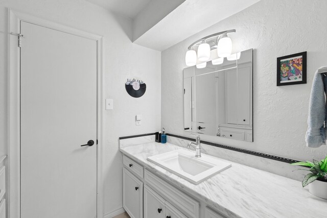 5918 Donwhite Ln, Houston, TX 77088 - bathroom with vanity and a textured wall