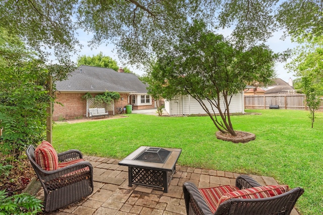 5918 Donwhite Ln, Houston, TX 77088 - view of yard with a patio area and a fire pit