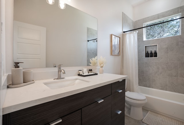 7612 Ave L, Houston, TX 77012 - full bath featuring tile patterned flooring, vanity, toilet, and shower / tub combo