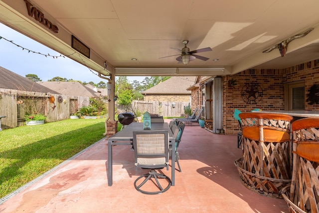 18107 Banpo Ct, Houston, TX 77044 - view of patio featuring outdoor dining space and a ceiling fan