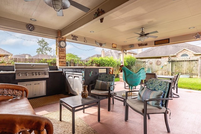 18107 Banpo Ct, Houston, TX 77044 - view of patio featuring a ceiling fan, exterior kitchen, a fenced backyard, grilling area, and outdoor lounge area