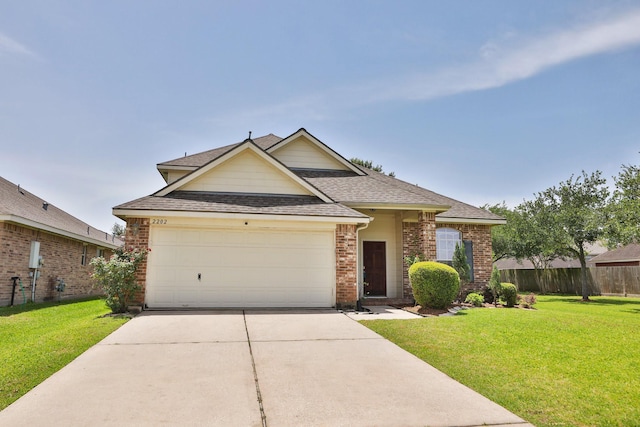 2202 Sugar Hill Dr, Deer Park, TX 77536 - traditional-style home featuring driveway, a shingled roof, an attached garage, and brick siding