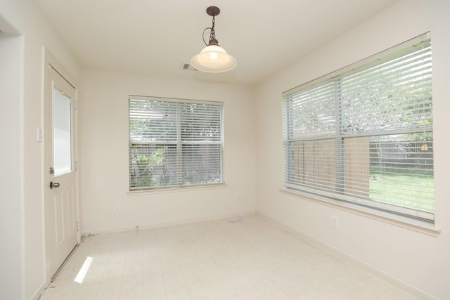 2202 Sugar Hill Dr, Deer Park, TX 77536 - spare room with healthy amount of natural light and baseboards