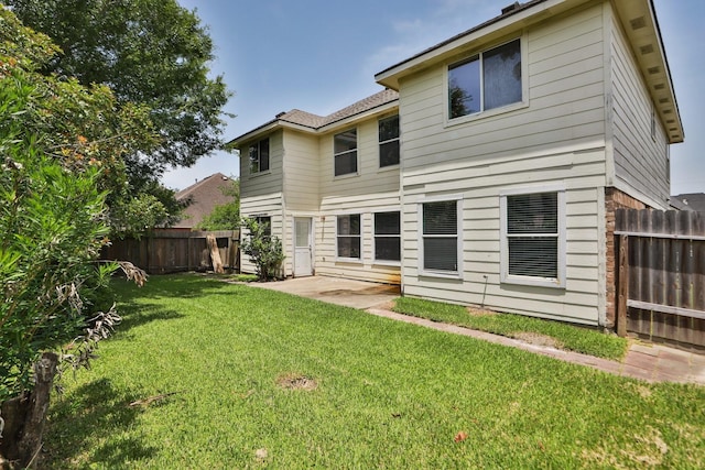 2202 Sugar Hill Dr, Deer Park, TX 77536 - rear view of house with a patio area