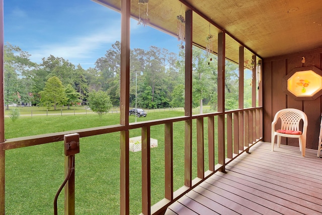 204 Rd 2764, Rye, TX 77327 - unfurnished sunroom with view of scattered trees