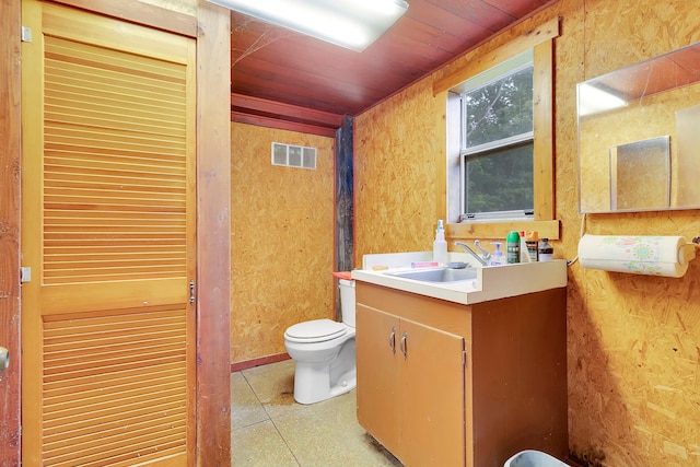 204 Rd 2764, Rye, TX 77327 - bathroom featuring toilet, vanity, and wood ceiling
