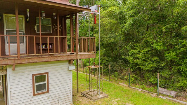 204 Rd 2764, Rye, TX 77327 - view of grassy yard featuring covered porch