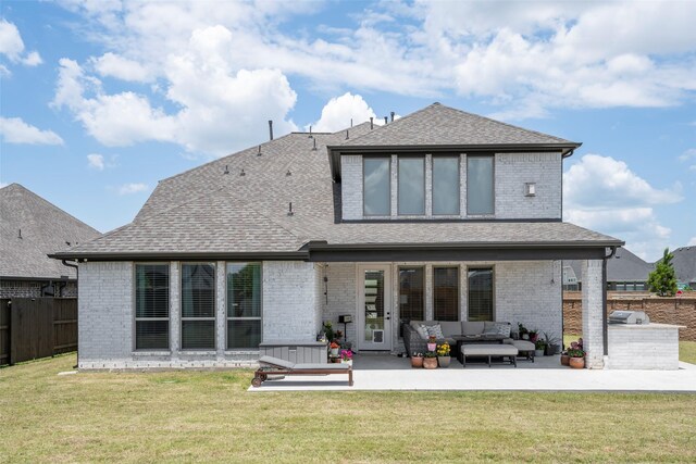 7507 Zion Grove Ct, Katy, TX 77493 - rear view of property with a patio, an outdoor kitchen, brick siding, and an outdoor hangout area