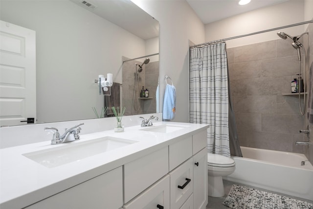 7507 Zion Grove Ct, Katy, TX 77493 - bathroom with shower / tub combo, toilet, double vanity, recessed lighting, and tile patterned flooring