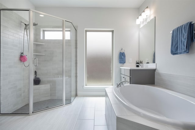 7507 Zion Grove Ct, Katy, TX 77493 - full bath with a stall shower, a garden tub, vanity, and tile patterned flooring