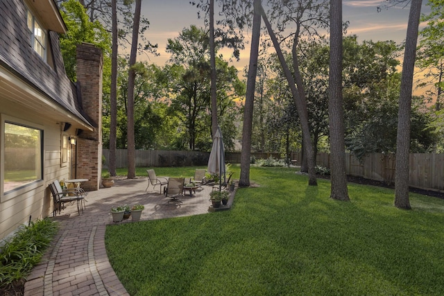 5407 Westminister Ct, Houston, TX 77069 - yard at dusk with a patio