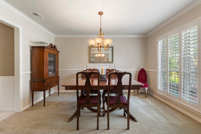 5407 Westminister Ct, Houston, TX 77069 - dining space with light colored carpet, a chandelier, ornamental molding, and baseboards