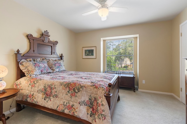 5407 Westminister Ct, Houston, TX 77069 - bedroom featuring light carpet, baseboards, and ceiling fan