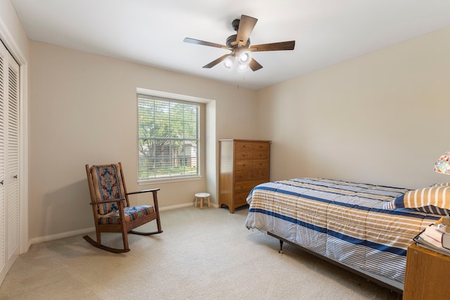 5407 Westminister Ct, Houston, TX 77069 - bedroom with a closet, light carpet, baseboards, and a ceiling fan