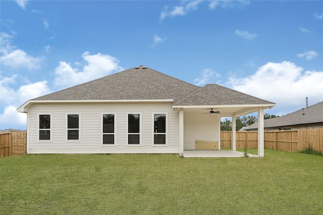 117 Big Spring Dr, Anahuac, TX 77514 - rear view of house featuring ceiling fan, roof with shingles, and a patio area