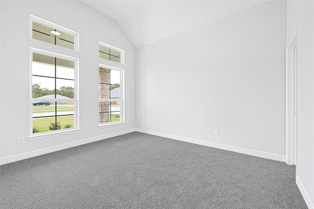 117 Big Spring Dr, Anahuac, TX 77514 - empty room with vaulted ceiling, carpet flooring, and baseboards