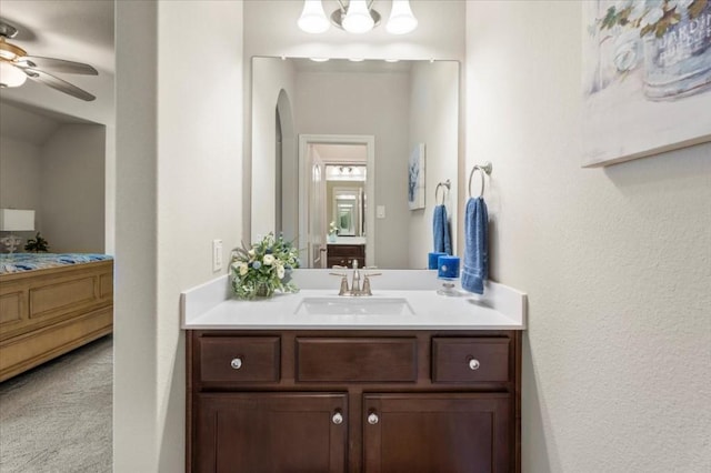 bathroom with ceiling fan and vanity