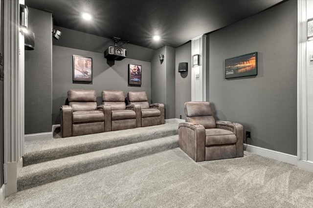 carpeted cinema room featuring baseboards and recessed lighting