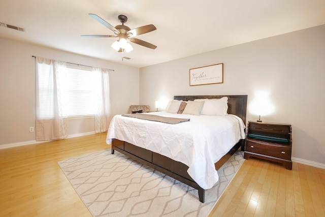 11606 Curry Ridge Ln, Tomball, TX 77377 - bedroom featuring wood finished floors, baseboards, and ceiling fan