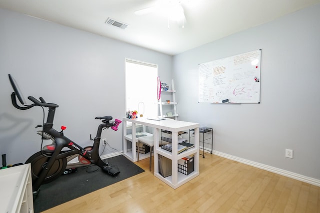 11606 Curry Ridge Ln, Tomball, TX 77377 - exercise room featuring wood finished floors, baseboards, and ceiling fan