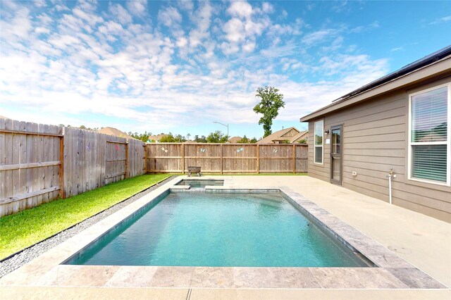 19015 Buckley Oak Dr, New Caney, TX 77357 - view of pool featuring a patio, a fenced backyard, and a pool with connected hot tub