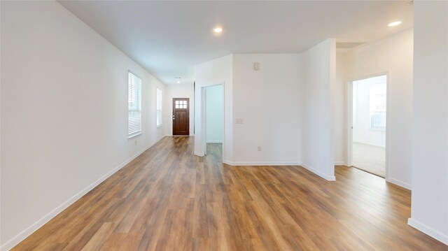 19015 Buckley Oak Dr, New Caney, TX 77357 - spare room featuring wood finished floors, baseboards, and recessed lighting