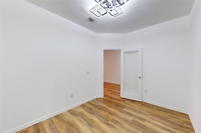19015 Buckley Oak Dr, New Caney, TX 77357 - unfurnished room featuring light wood finished floors and baseboards