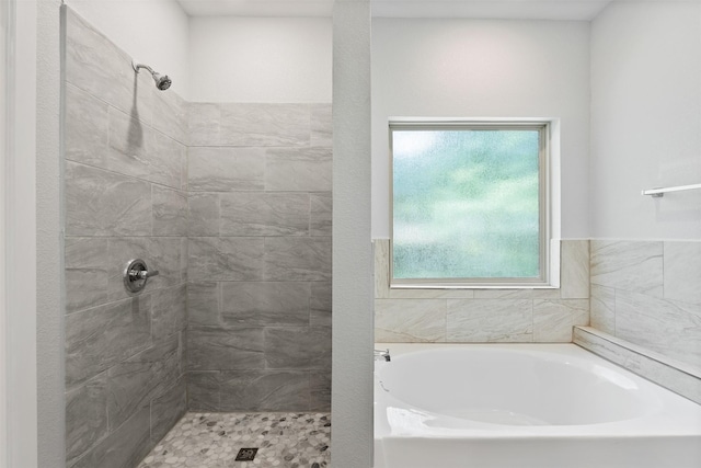 237 Camden Hills Dr, Montgomery, TX 77356 - full bathroom with tiled shower and a garden tub
