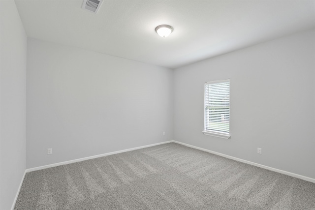 237 Camden Hills Dr, Montgomery, TX 77356 - carpeted spare room with baseboards