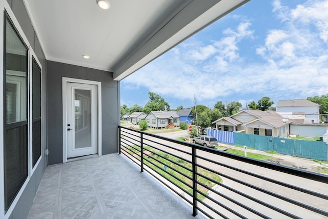 balcony featuring a residential view