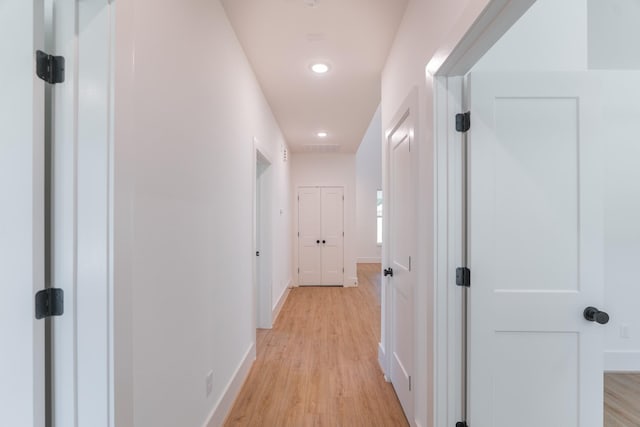 3203 Hemingway Dr, Montgomery, TX 77356 - hallway with light wood-style floors, baseboards, and recessed lighting