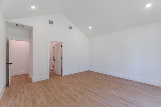 3203 Hemingway Dr, Montgomery, TX 77356 - empty room with light wood finished floors, baseboards, recessed lighting, and high vaulted ceiling