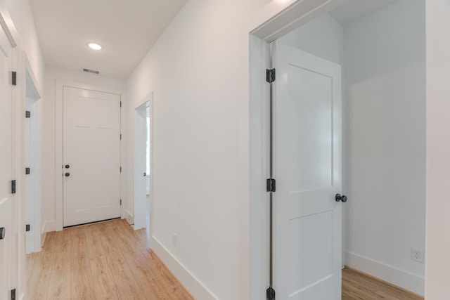3203 Hemingway Dr, Montgomery, TX 77356 - hall featuring light wood-style flooring, baseboards, and recessed lighting