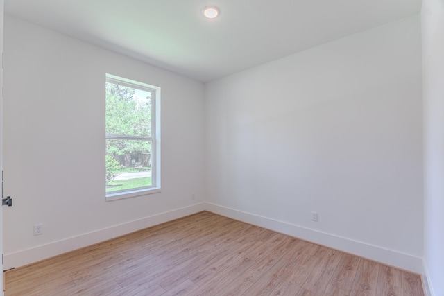 3203 Hemingway Dr, Montgomery, TX 77356 - unfurnished room featuring baseboards and light wood finished floors