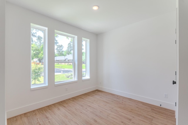 3203 Hemingway Dr, Montgomery, TX 77356 - empty room featuring baseboards, light wood-type flooring, and recessed lighting