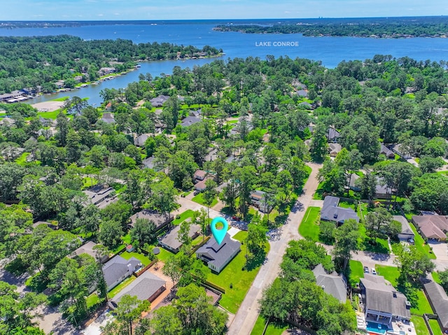 3203 Hemingway Dr, Montgomery, TX 77356 - aerial perspective of suburban area featuring a large body of water