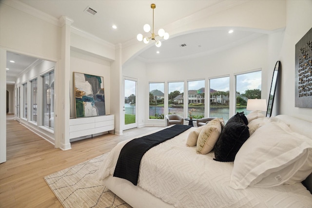 22 Berenger Pl, Sugar Land, TX 77479 - bedroom featuring ornamental molding, a chandelier, a water view, light wood-type flooring, and recessed lighting