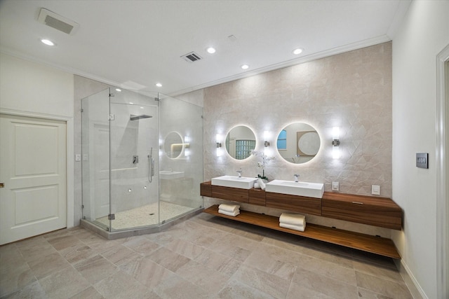 22 Berenger Pl, Sugar Land, TX 77479 - bathroom featuring ornamental molding, tile walls, a shower stall, double vanity, and recessed lighting