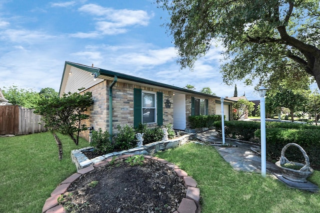 ranch-style home featuring an attached garage and stone siding