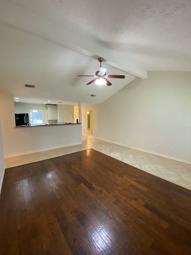 13430 Firebrick Dr, Houston, TX 77041 - unfurnished living room featuring light wood-type flooring, ceiling fan, and baseboards