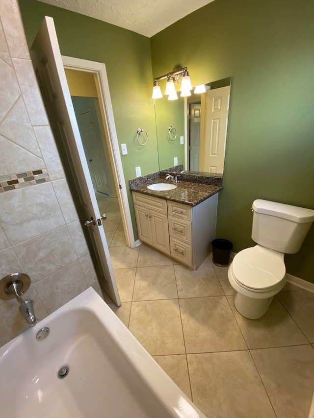 13430 Firebrick Dr, Houston, TX 77041 - full bathroom featuring vanity, toilet, tile patterned floors, and baseboards