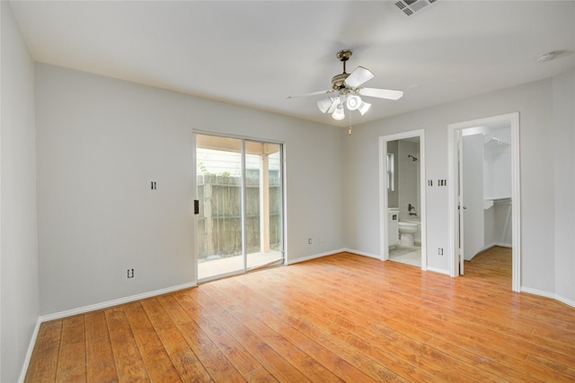 12409 Urban Dale Ct, Houston, TX 77082 - unfurnished bedroom featuring access to outside, baseboards, and light wood-style flooring
