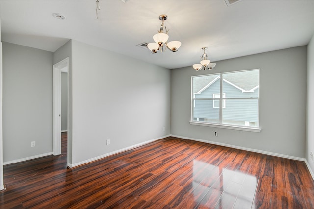 12409 Urban Dale Ct, Houston, TX 77082 - spare room with a chandelier, wood finished floors, and baseboards