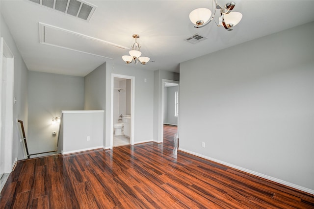 12409 Urban Dale Ct, Houston, TX 77082 - spare room with a chandelier, wood finished floors, and baseboards